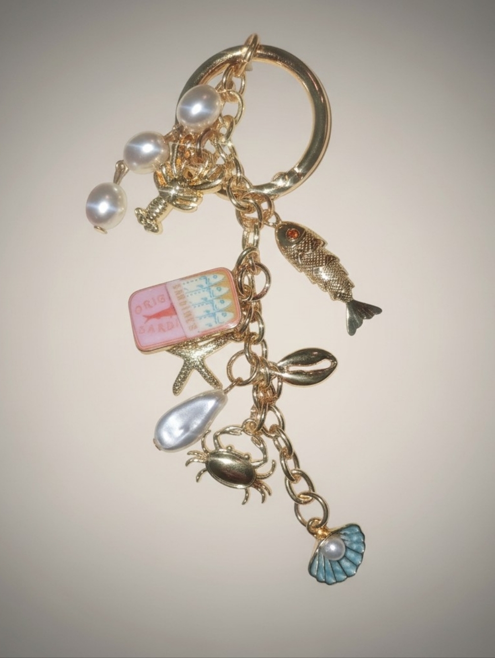 Gold Charm Keychain with Pearls and Sea-themed Charms - Pink/Blue Accents